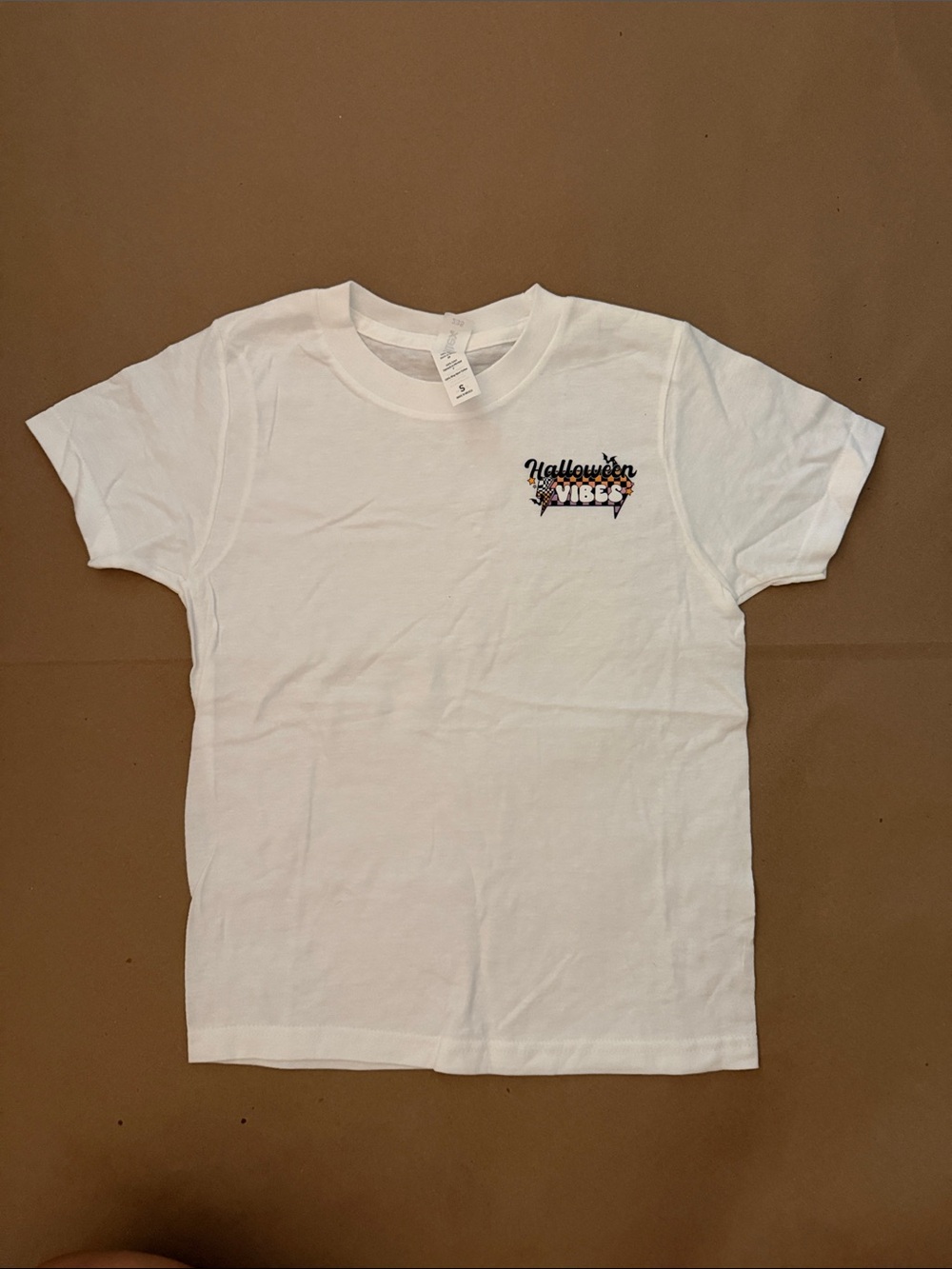 White Kids T-Shirt with Small Halloween Vibes Chest Graphic